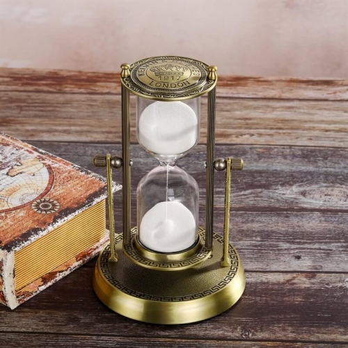Rotating brass hourglass decor