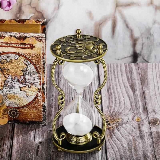 Brass sun hourglass decor