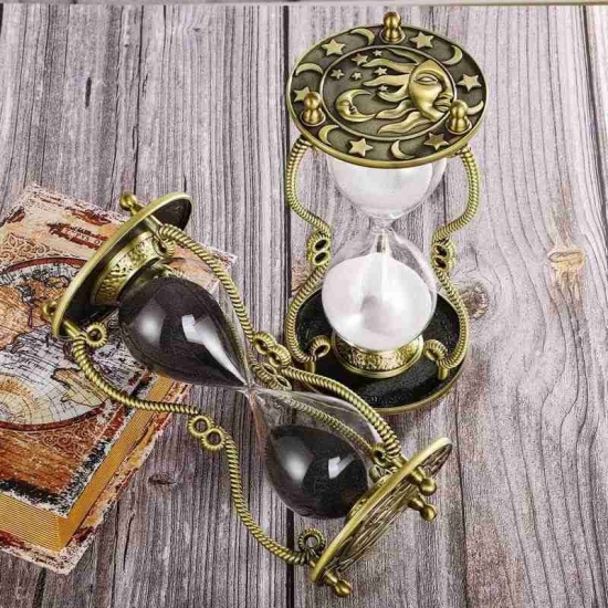 Brass sun hourglass decor