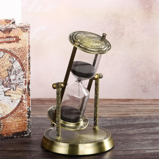 Rotating brass hourglass decor